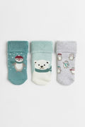 This is a 3-pack of H&M terry socks with a foldover cuff and non-slip protection