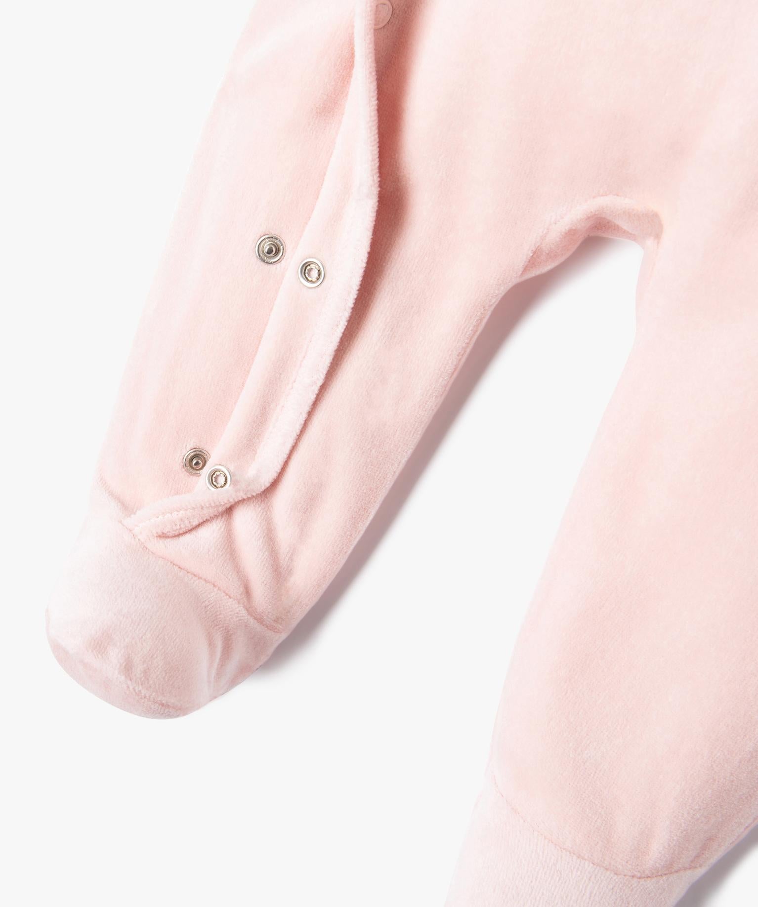 Pink velour pyjamas with glittery lettering for baby girl