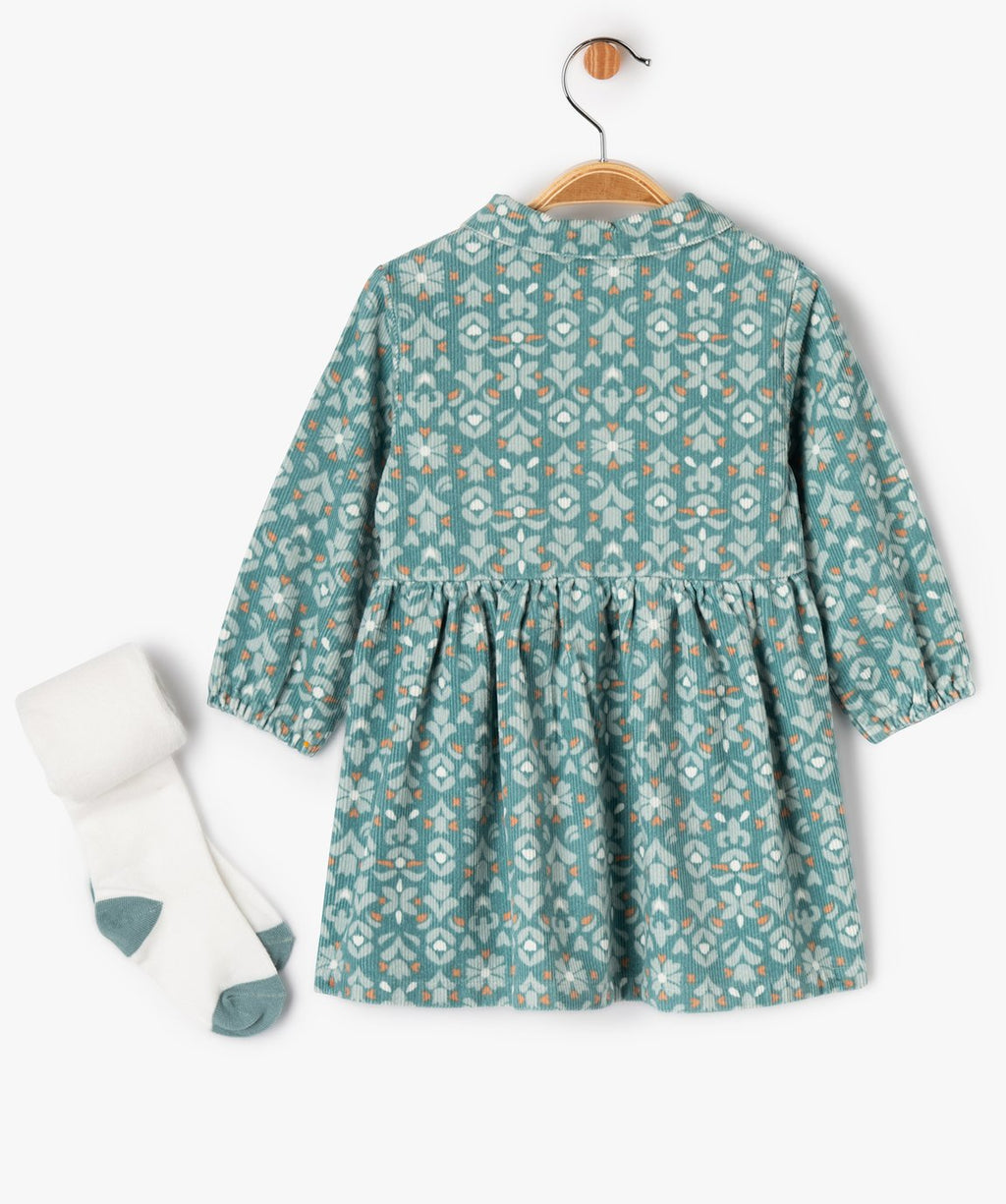 Back view of the GÉMO teal floral baby dress with accompanying tights