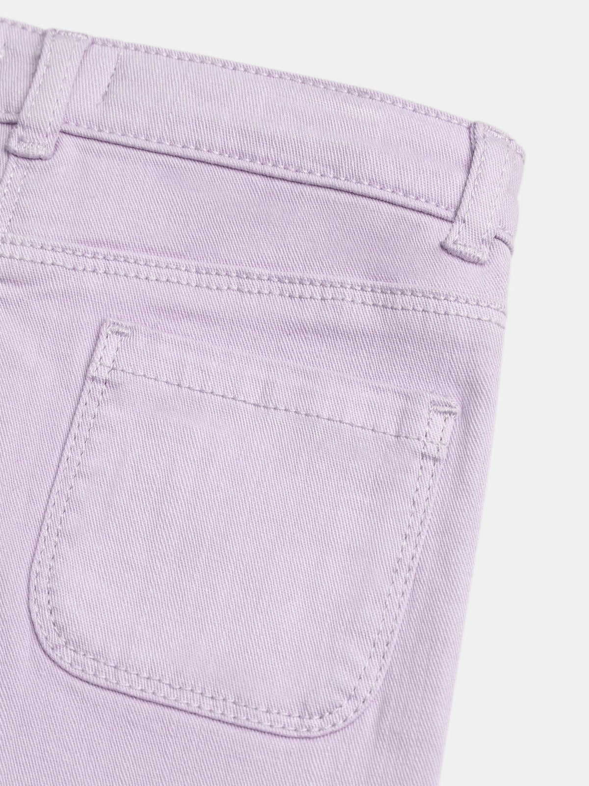 GÉMO lilac denim waist and pocket close-up