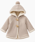 Beige knitted sherpa-lined baby hooded coat with pompom and toggles