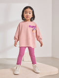 Front of Next girls pink bunny sweatshirt and checked leggings set