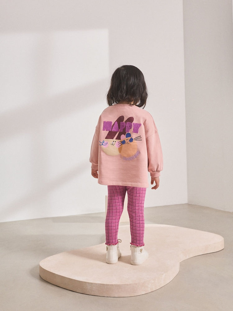 Back of Next girls pink bunny sweatshirt and checked leggings set